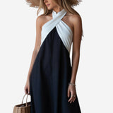 María | Vestido elegante con espalda descubierta y cuello cruzado a la moda