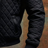 Ramiro - Chaqueta negra acolchada con hombros de cuero